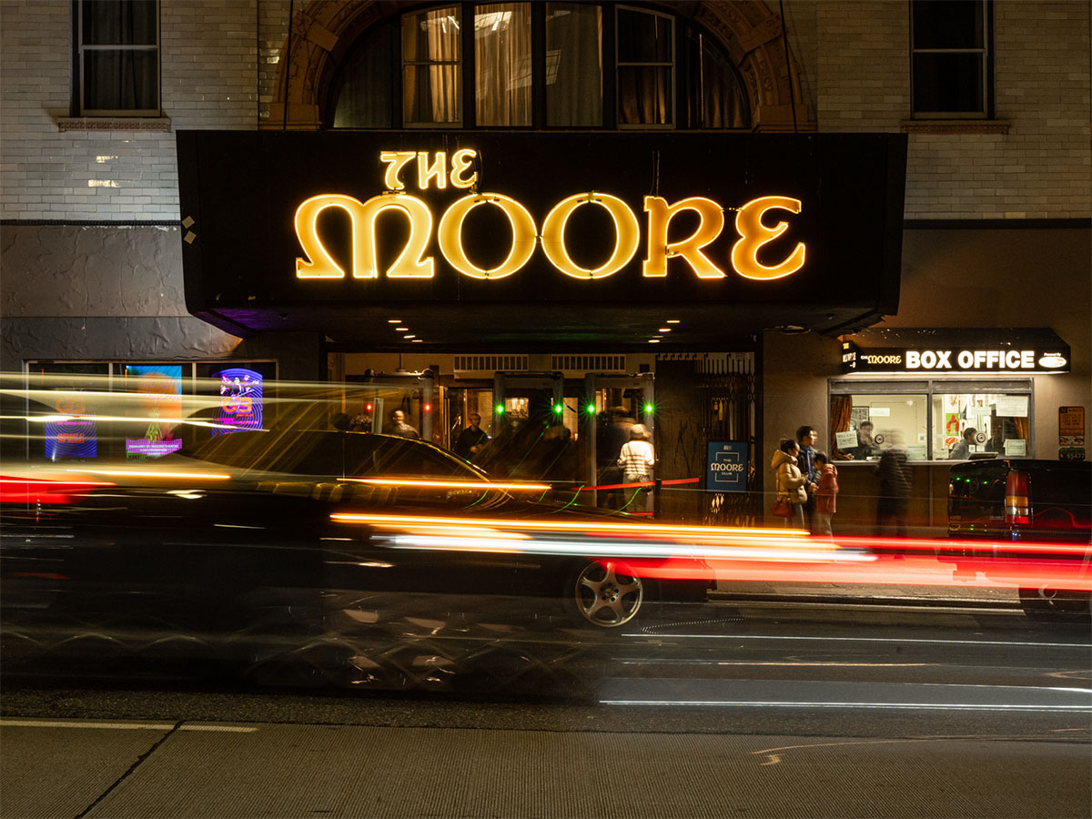 Moore Theatre marquee at night